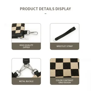 Black and white checkerboard wristlet wallet detail view showing high quality zipper and strap