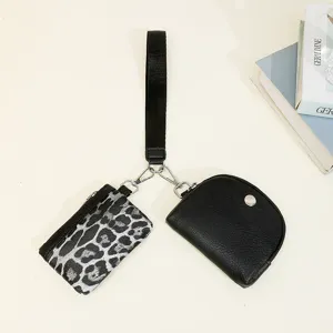 Detail view of the chic 2-in-1 womens wrist pouch, highlighting dual compartment details.