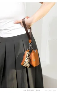 Stylish 2-in-1 women wristlet bag with leopard and brown pouches, portable and chic.