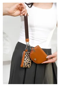 Women two-in-one mini wrist bag set, portable coin purse and card holder with brown strap.