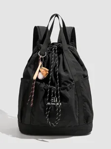 Black nylon drawstring backpack casual daily travel daypack with cute baseball charm