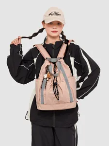 Casual nylon drawstring backpack for women, lightweight travel daypack in pink color.