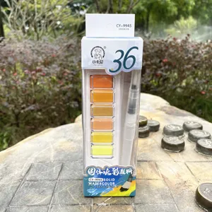 Detailed view of the 36-color solid watercolor paint set packaging with a water brush pen.
