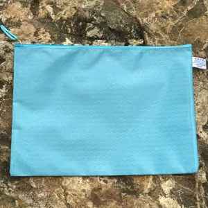 Detail view of the blue waterproof canvas A4 zipper document bag with handy pull cord storage.