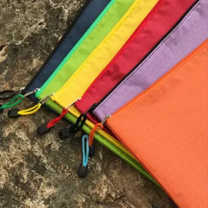Detailed view of colorful A4 waterproof zipper file bag canvas storage pouch for documents.