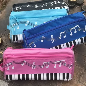 Estuche de lápices de doble capa con teclas de piano y notas musicales, bolsa escolar.