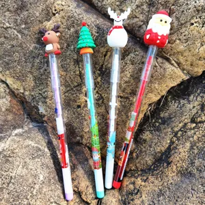 Christmas theme stacking pencils with cute cartoon toppers like reindeer and santa for kids.