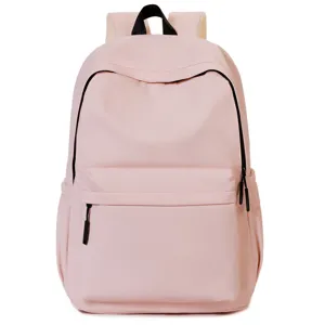 Minimalist pink backpack for daily use, large capacity school bookbag with front pocket view