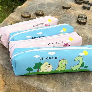 Detail view of cute cartoon dinosaur pencil case, featuring vibrant colors and smooth zipper.