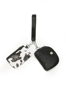 Fashion 2-in-1 women wrist pouch set with cow print card holder and black coin purse.