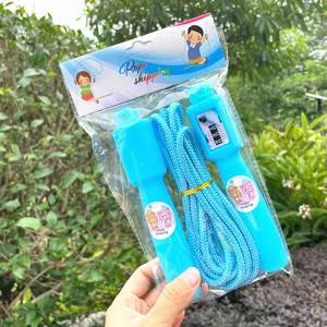 Close-up detail of children jumping rope with mechanical counter and comfortable plastic handles.
