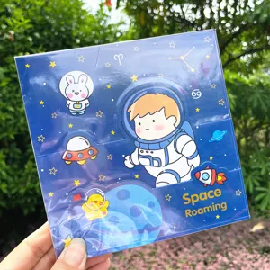 Cute space theme children origami paper handmade craft kit with cartoon astronaut patterns.