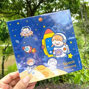 Cute space theme handmade craft paper and stickers with adorable cartoon astronauts for kids.