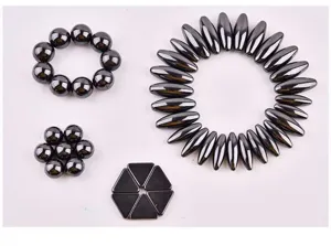 Set de jouets en hématite noire, aimants sphériques et ovales pour les expériences de physique.