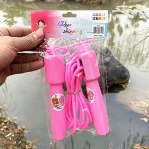 Pink skipping rope detail view, lightweight plastic handles for student fitness and school sports training.
