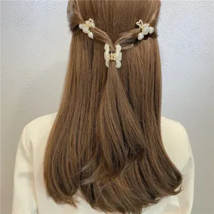 Pearl hair claw clip for women, Korean style geometric gold metal hairpin for daily styling.