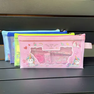 Close-up detail of multi-color mesh pencil cases with cute unicorn print for students.