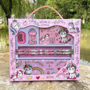Cute unicorn stationery gift set detail featuring colorful notebooks, pencils, ruler, and eraser.
