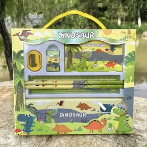 Close-up view of the dinosaur stationery set gift box, showing pencils, ruler and case details.