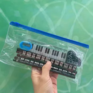 Set di matite musicali creative con astuccio trasparente, tasti di pianoforte e gomma simpatica.