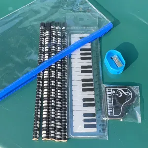 Set cancelleria musicale bambini con matite tasti piano righello gomma per scuola.