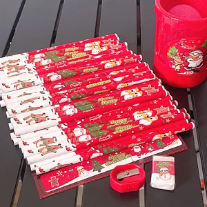 Set de papelería navideña con bonitos lápices de Papá Noel, regla, goma y sacapuntas.