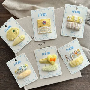 Cream yellow fabric hair clips detail, cute floral and heart children bangs clip set.