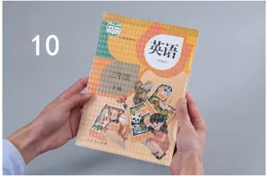 Close-up detail of thickened frosted transparent book cover protecting school textbooks safely.