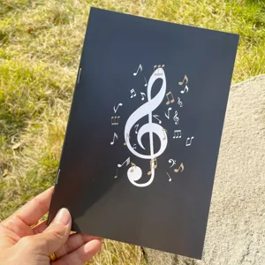 A5 Notizbuch Musik mit schwarzem Cover eleganten goldenen Noten und Notenschlüssel Detail