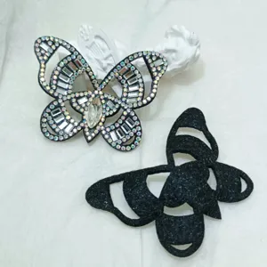 Rhinestone butterfly DIY accessory patches, sparkling crystal shoe and hair clip decor materials.