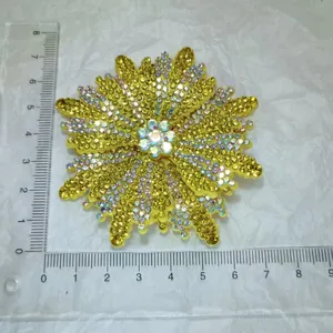 Handmade yellow rhinestone shoe flower patch, sparkling crystal floral accessory for footwear.