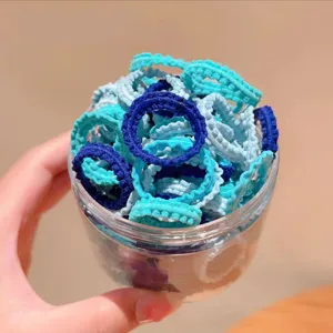Elastici per capelli colorati per bambini in barattolo trasparente, piccoli e molto carini.