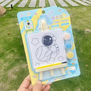 Children DIY painting set with mini easel canvas and pigments, cute astronaut art craft.