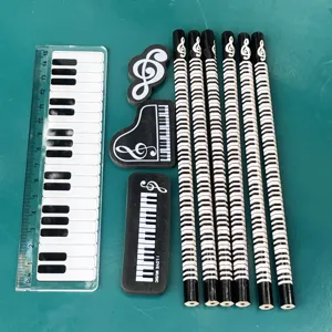 Music stationery set with piano key pencils erasers and clear ruler for school kids learning.