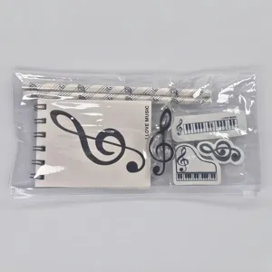 Detailed view of the music theme stationery set, featuring notebooks, pencils, and musical erasers.
