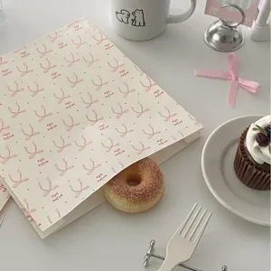 Korean style bow white kraft paper bag for gift wrapping, baking storage and photography props.