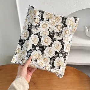 Waterproof express mailing bag with white camellia flower and pearl pattern for clothing.