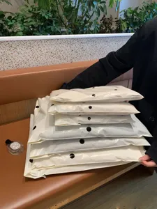 Milk white polka dot courier bags, thickened waterproof packaging bags for clothing shipping.