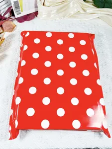 Thick polka dot shipping mailer bag detail view for secure clothing and item packaging.