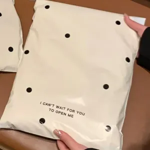 Thickened waterproof white poly mailer with black polka dots and cute English print.