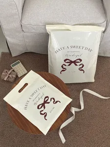 Thickened waterproof plastic packaging bag with cute bow design, durable express bag.