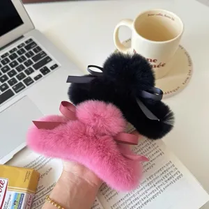 Pince à cheveux en peluche automne hiver avec nœud élégant pour femmes et filles style quotidien.