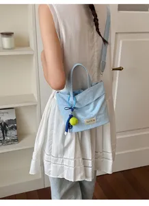 Sac bandoulière en toile à pois bleus sac seau décontracté léger avec pendentif tennis mignon femme