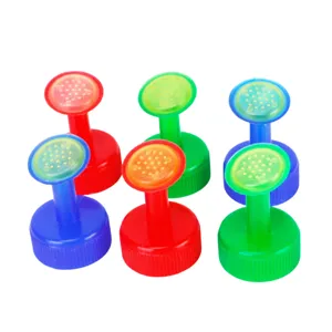 Plastic watering can nozzle detail view, colorful garden sprinkler caps for potted plants and small gardening.