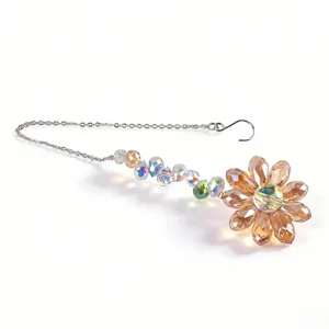 Crystal suncatcher flower pendant with colorful beads and metal chain for window decor.
