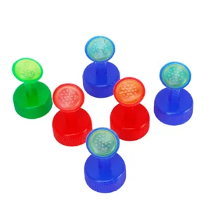 Plastic bottle cap sprinkler heads for garden potted plants, multi-color watering tools.