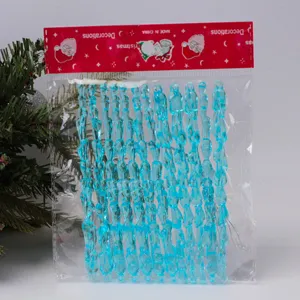 Blue acrylic icicle Christmas hanging pendants set in packaging bag for holiday party decor.