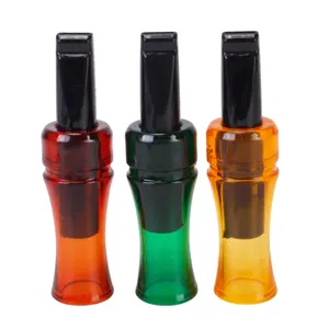 Detailed view of acrylic bionic crow and duck hunting calls in red, green, and yellow.