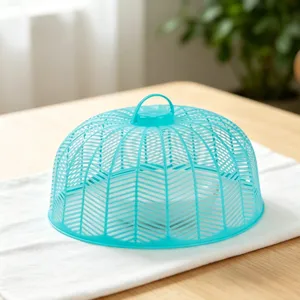 Plastic food cover detail view showing mesh ventilation design and convenient top handle.