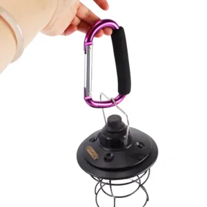 Portable purple aluminum carabiner with foam grip attached to mini camping LED light.